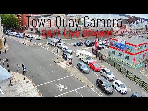 Live view of Southampton ferry terminal with ships docking in Hampshire, England
