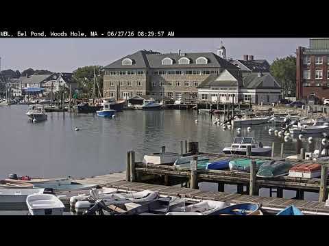 Live view of Eel Pond waterfront and boats in Falmouth Massachusetts USA