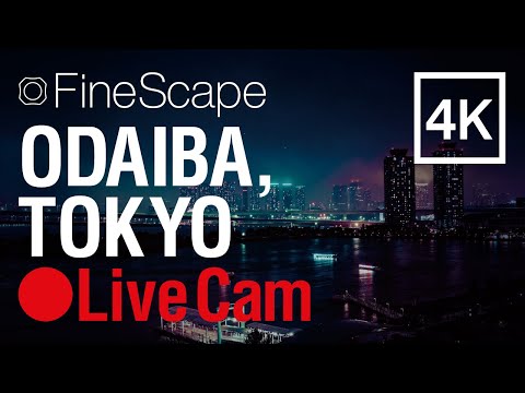 Odaiba waterfront and Rainbow Bridge illuminated at night in Tokyo, Japan live webcam view