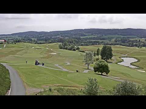 Axis M1125 live webcam showing panoramic view of Slattum Norway scenic landscape